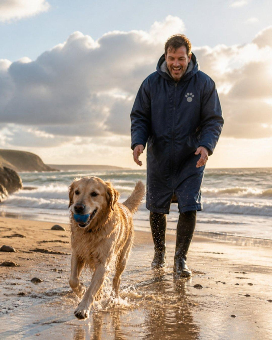Winter beach with a Golden Retriever in the Pooch All Weather Robe