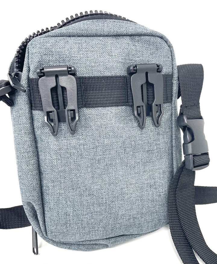 Rear view of grey Walkies Dog Walking Bag with belt clips and adjustable strap.