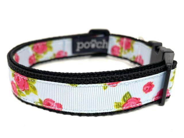 Adjustable rose dog collar with durable clip, high-quality webbing, and stainless steel D-rings.