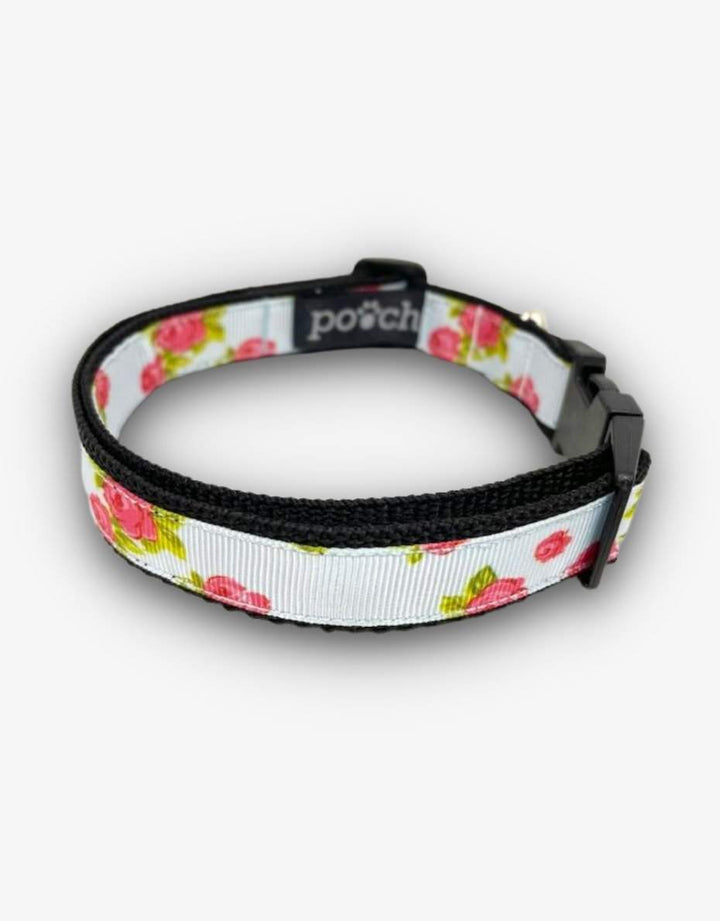 Adjustable rose dog collar with durable clip and stainless steel D-rings.